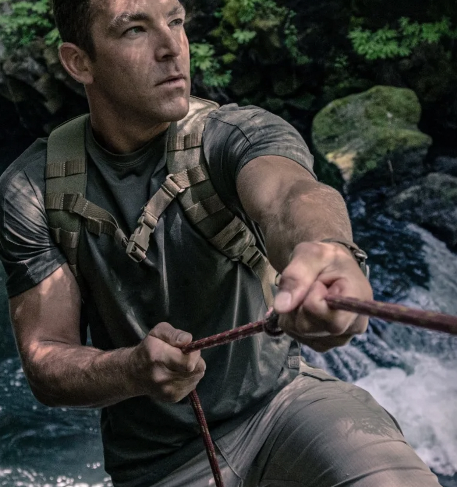 Man outdoors with tactical gear