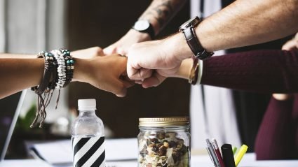 Image of a group fist bump
