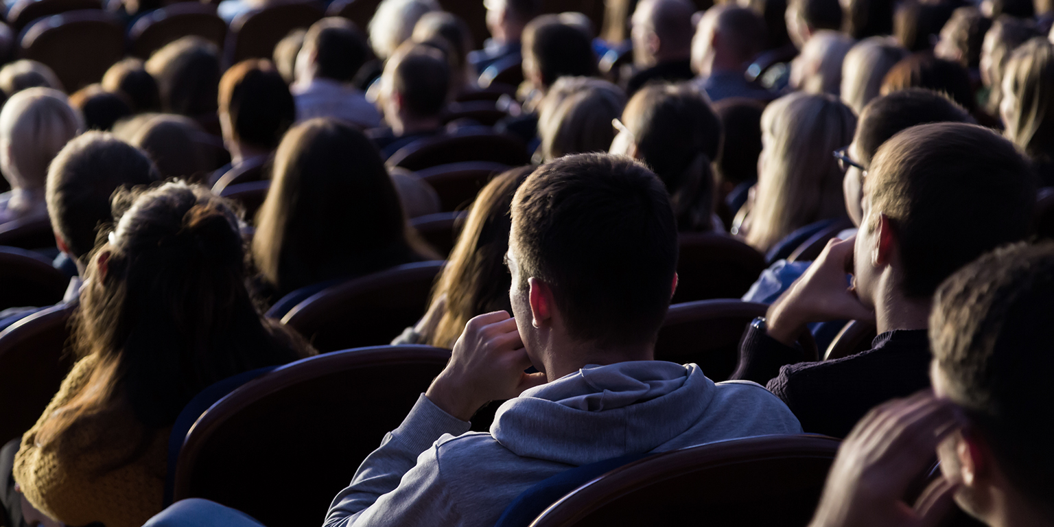 people sitting in movie theater