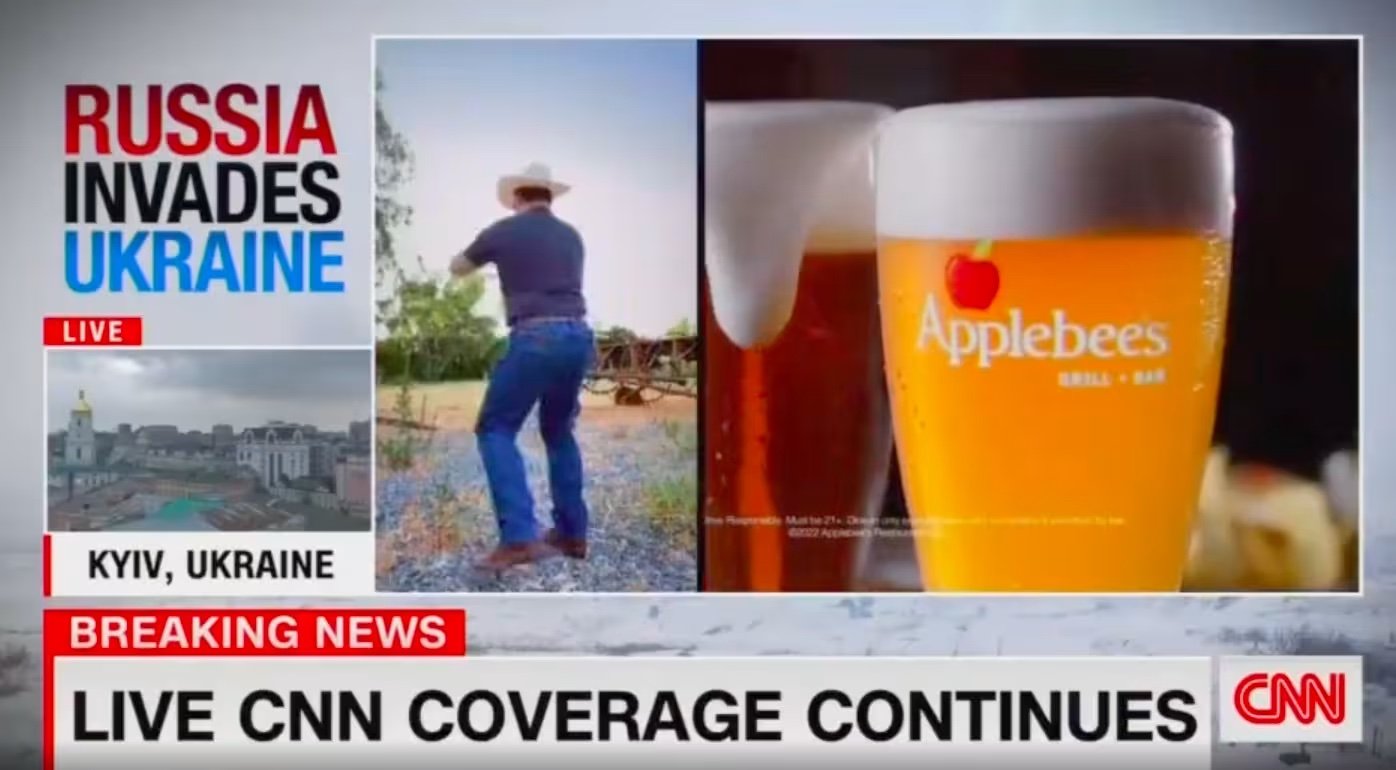 Example of why you need agility in your marketing. Applebee's ad next to invasion of ukraine.