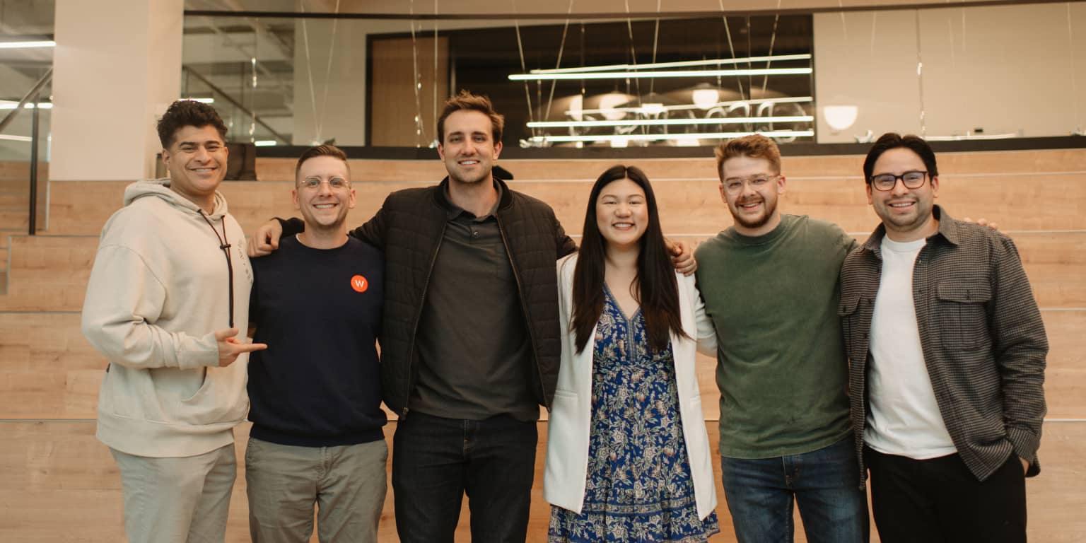 6 Wpromote employees posing for a photo in the LA office