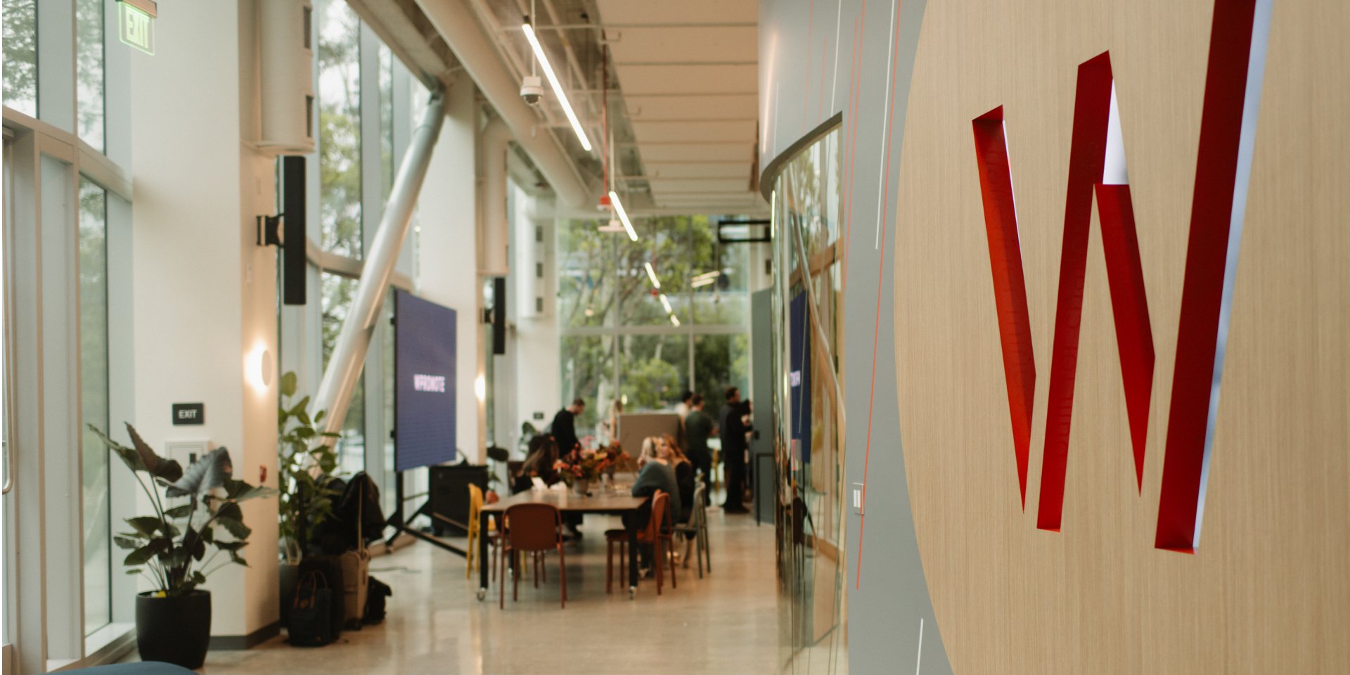 Closeup photo of Wpromote logo on the wall of the LA office